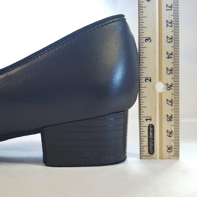 Heel height is 1-1/4" at the back seam.