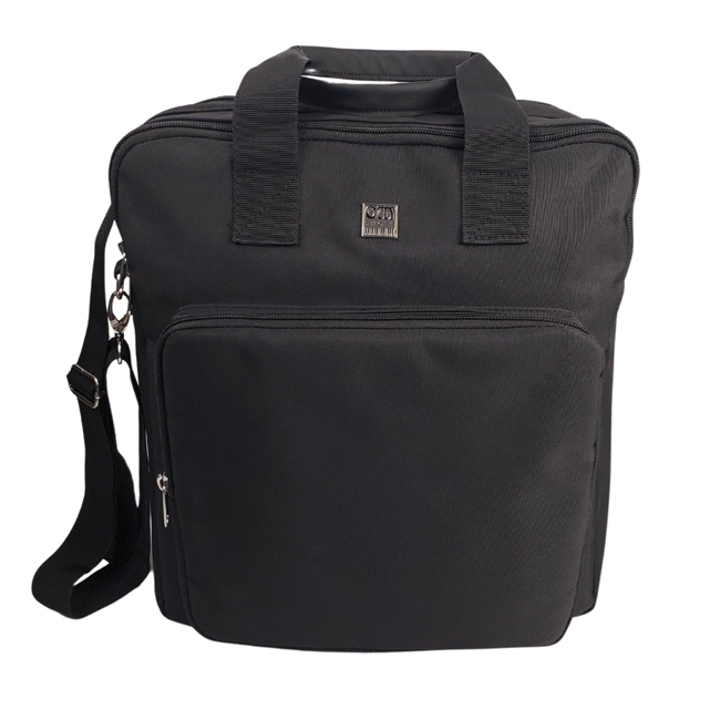 A black tote bag designed for carrying organ shoes and sheet music, featuring multiple compartments including a separate shoe compartment, a zippered side pocket, and a padded tablet pocket. The bag has a padded shoulder strap.